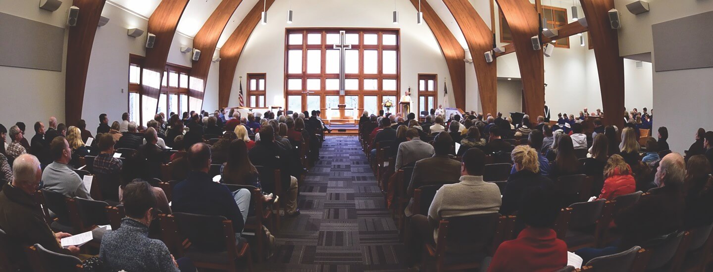 image of people sitting at mass